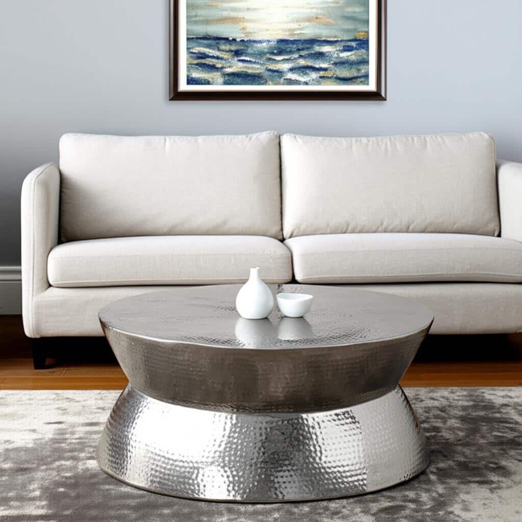HomeRoots 37" Silver Aluminum Round Distressed Solid Coffee Table - 37.00 in. x 16.50 in. x 37.00 in.