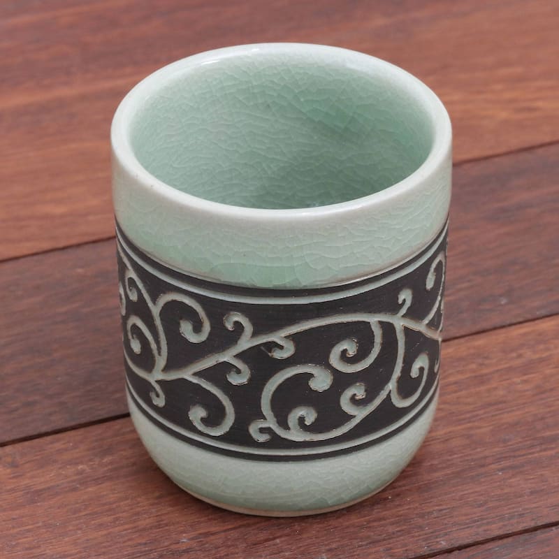 Handmade Kanok Tendrils Celadon ceramic teacup (Thailand)