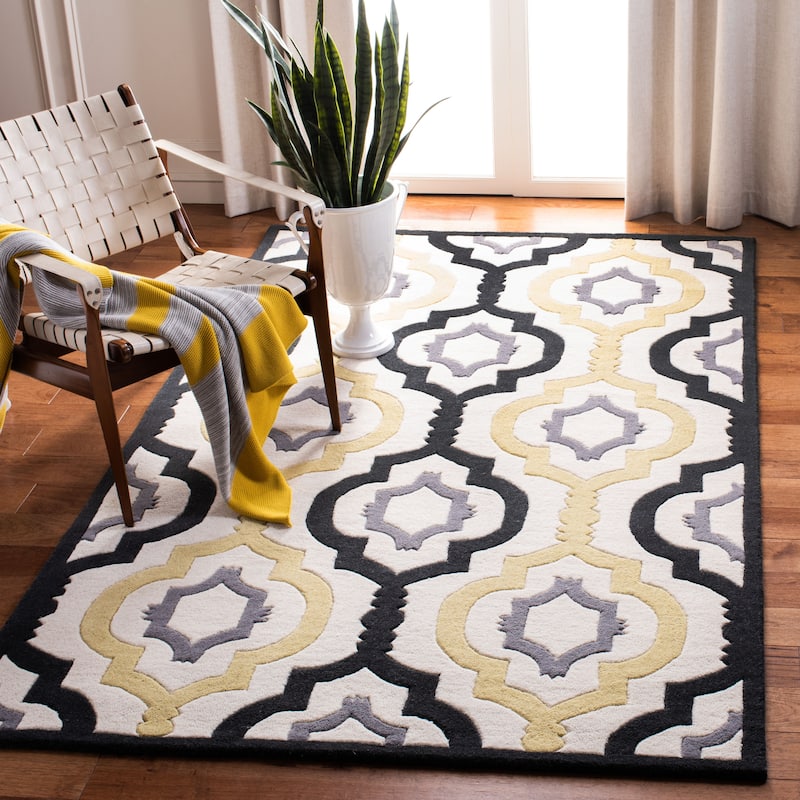 SAFAVIEH Handmade Chatham Vaka Modern Wool Rug - 5' x 8' - Ivory/Multi