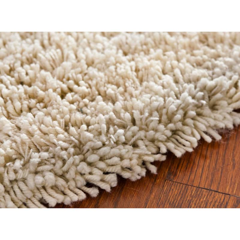 SAFAVIEH Handmade Classic Shag Nakhshun Rug