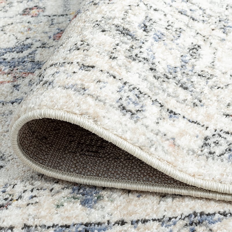 Addalyn Oriental Border Area Rug
