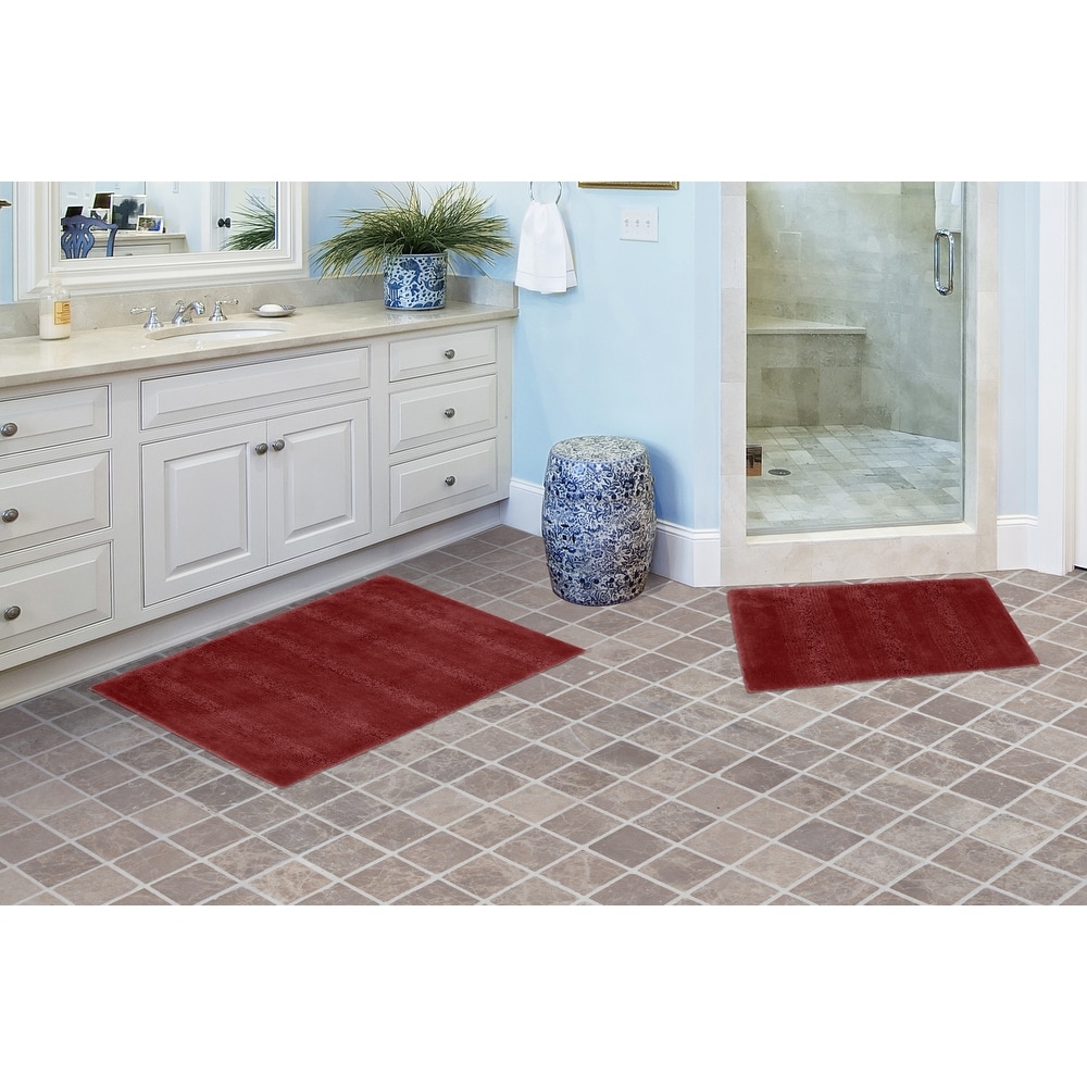 https://ak1.ostkcdn.com/images/products/is/images/direct/fb4becfb6f2fc04a853bdc228cf78292ec237d3a/Essence-Washable-Nylon-Plush-Bathroom-Rug%2C-or-Set-in-Chili-Red.jpg