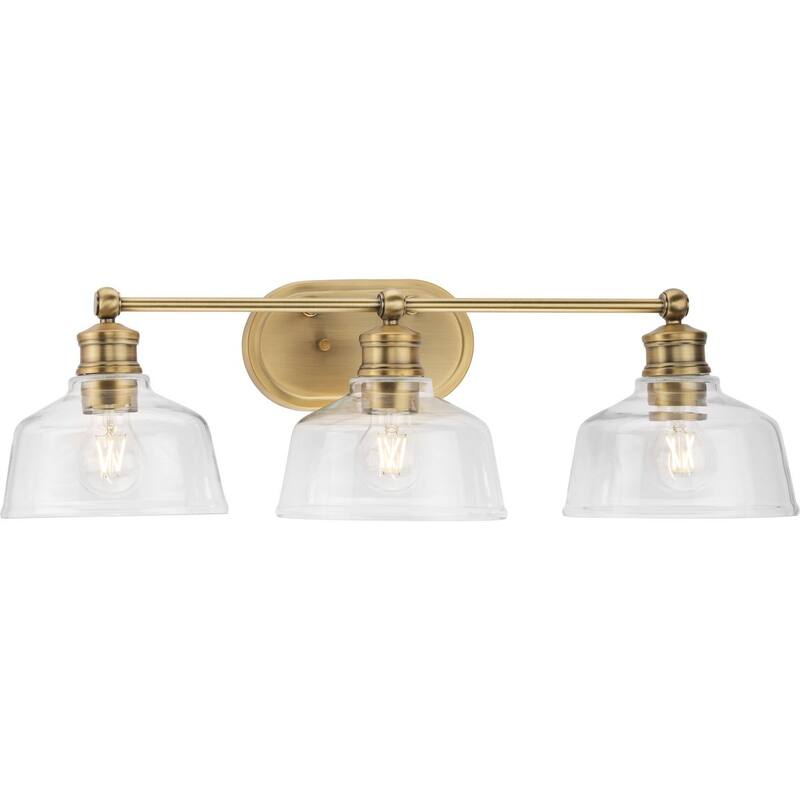 Singleton Collection 3-Light 26.5 in. Vintage Brass Vanity Light with Clear Glass Shades - Small