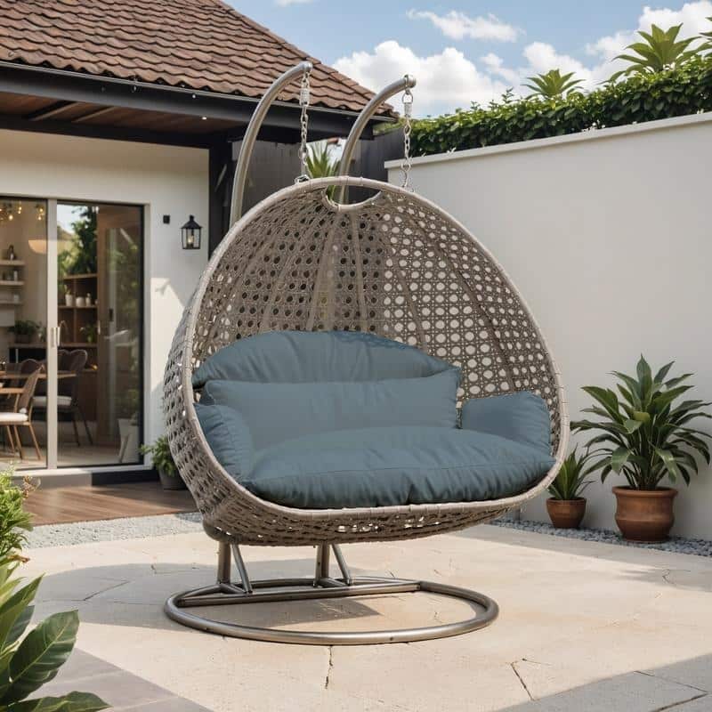 LeisureMod Modern 2-Person Egg Hanging Swing Chair with Beige Wicker, Oxford Fabric Cover, Patio Hammock Lounger and Cushions