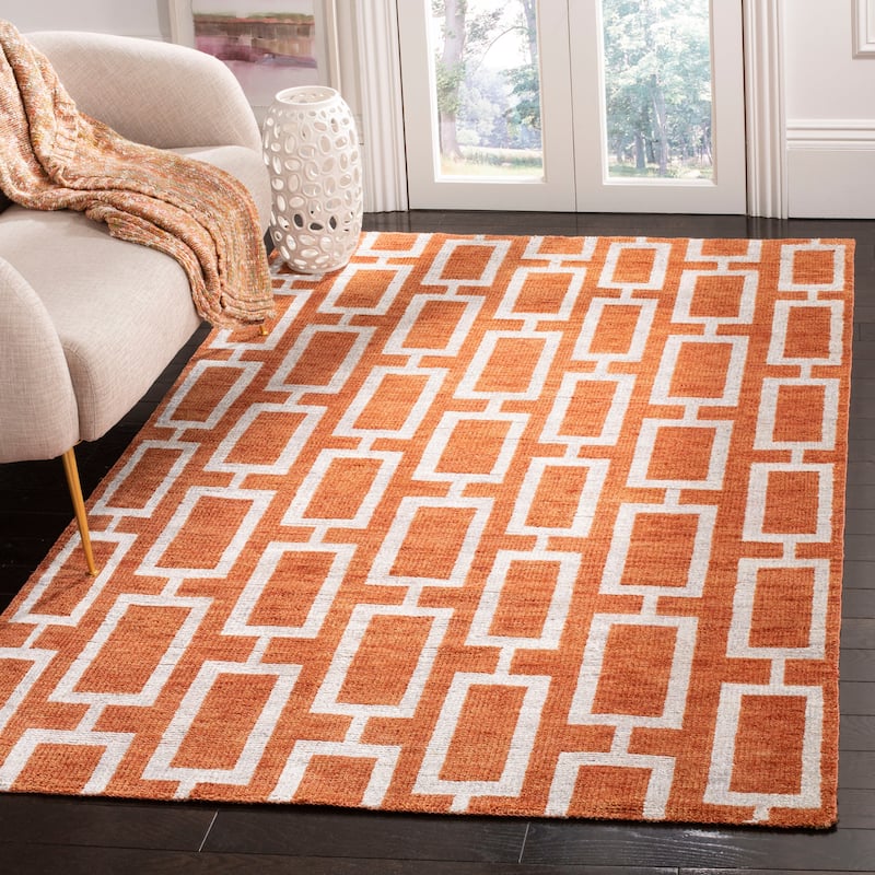 SAFAVIEH Hand-knotted Stone Wash Perpetue Modern Wool Rug - 5' x 8' - Rust