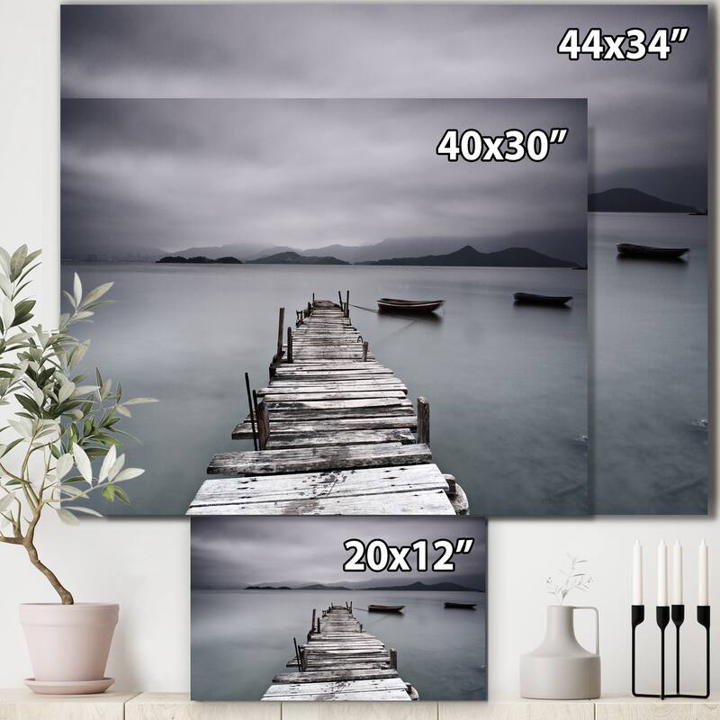 DesignArt "Pier and Boats at Seashore" Bridge and Pier Canvas Wall Art
