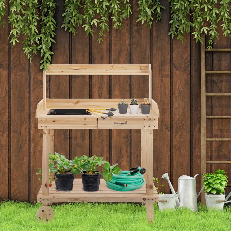 Outsunny 36.25" x 17.75" x 46.75'' Wooden Potting Bench Work Table with 2 Removable Wheels & Large Storage Spaces - Yellow