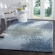 SAFAVIEH Handmade Soho Miyase Modern Burst New Zealand Wool Rug - 3'6" x 5'6" - Denim