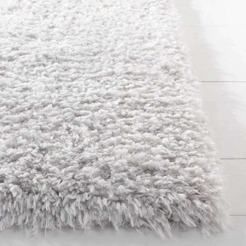 SAFAVIEH Flokati Vojsava Shag Solid Rug