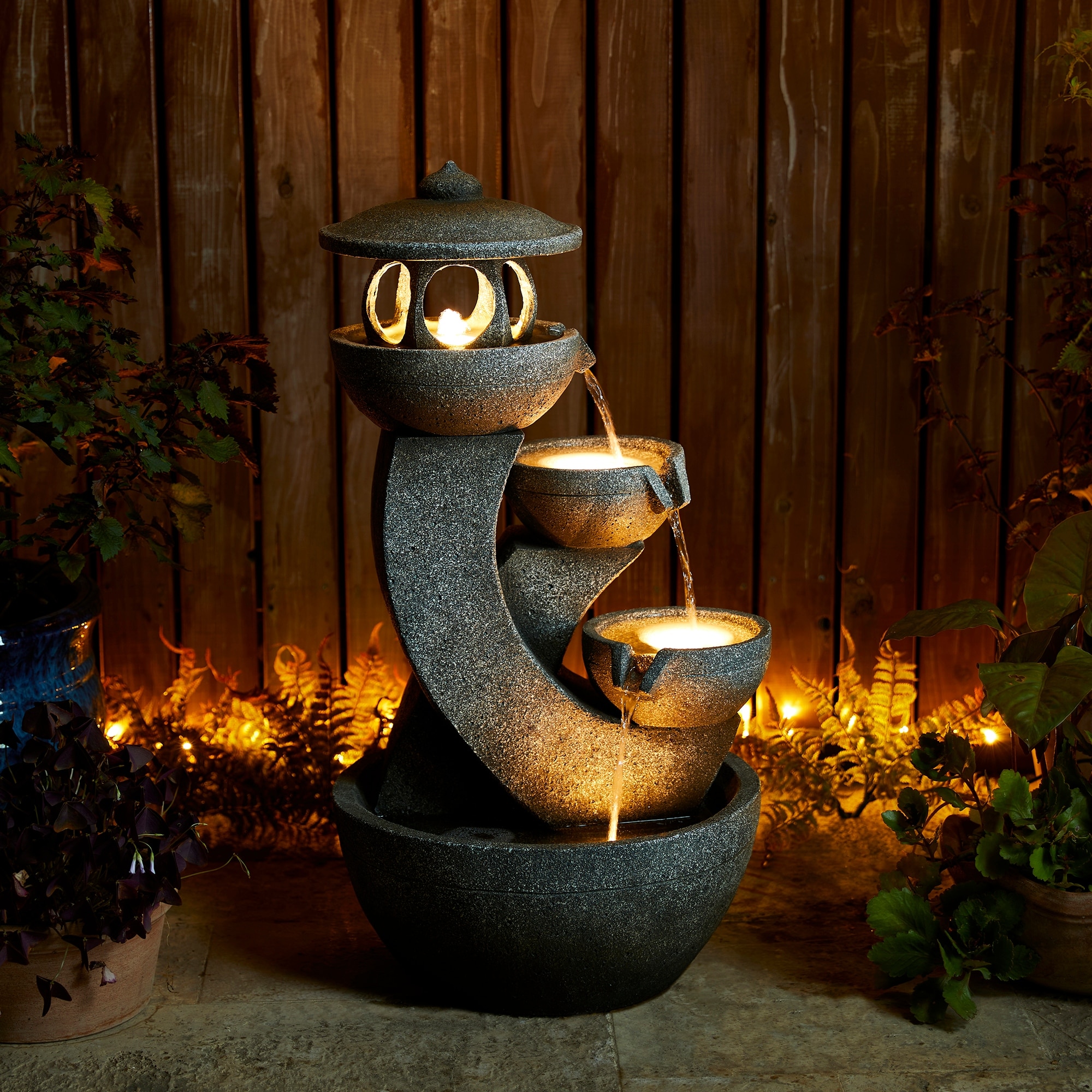 Glitzhome 32"H 4-Tiered Zen Pagoda Polyresin LED Lighted Outdoor Floor Water Fountain