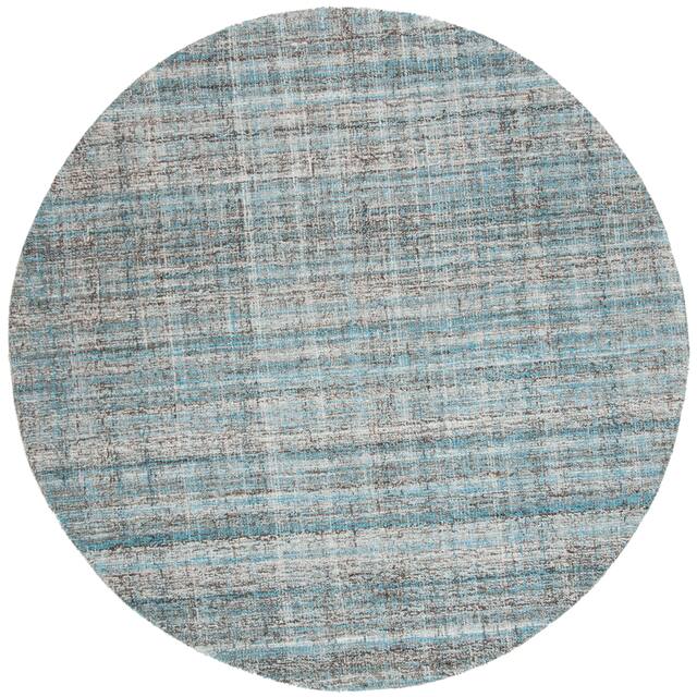 SAFAVIEH Handmade Abstract Nettie Modern Viscose Rug - 6' x 6' Round - Blue/Multi