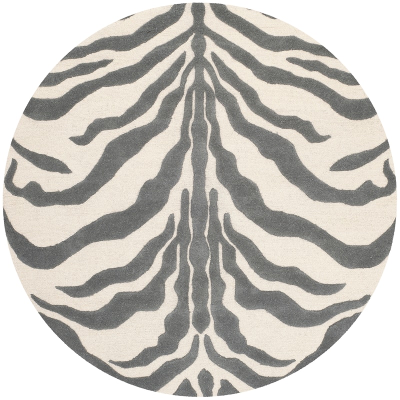 SAFAVIEH Handmade Cambridge Rikey Animal Print Wool Rug - 6' Round - Ivory/Dark Grey