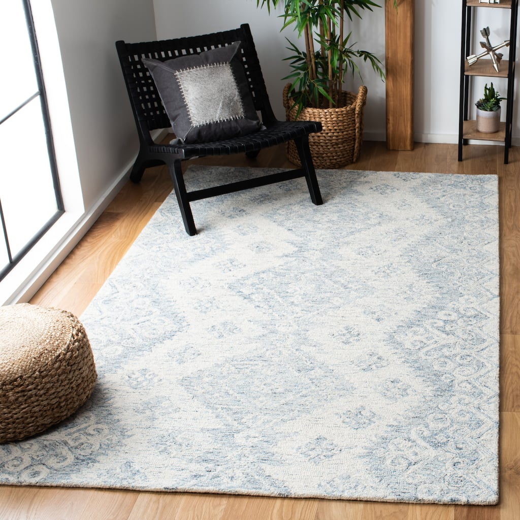 SAFAVIEH Handmade Micro-Loop Stella Modern Wool Rug - 5'