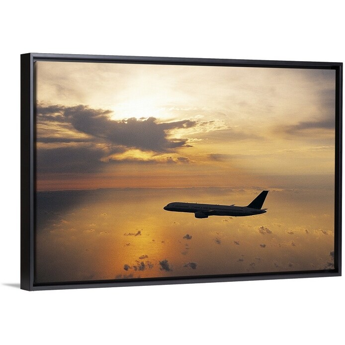 Shop Commercial Aeroplane Flying Above The Sea At Dusk Black Float Frame Canvas Art Overstock 25524221