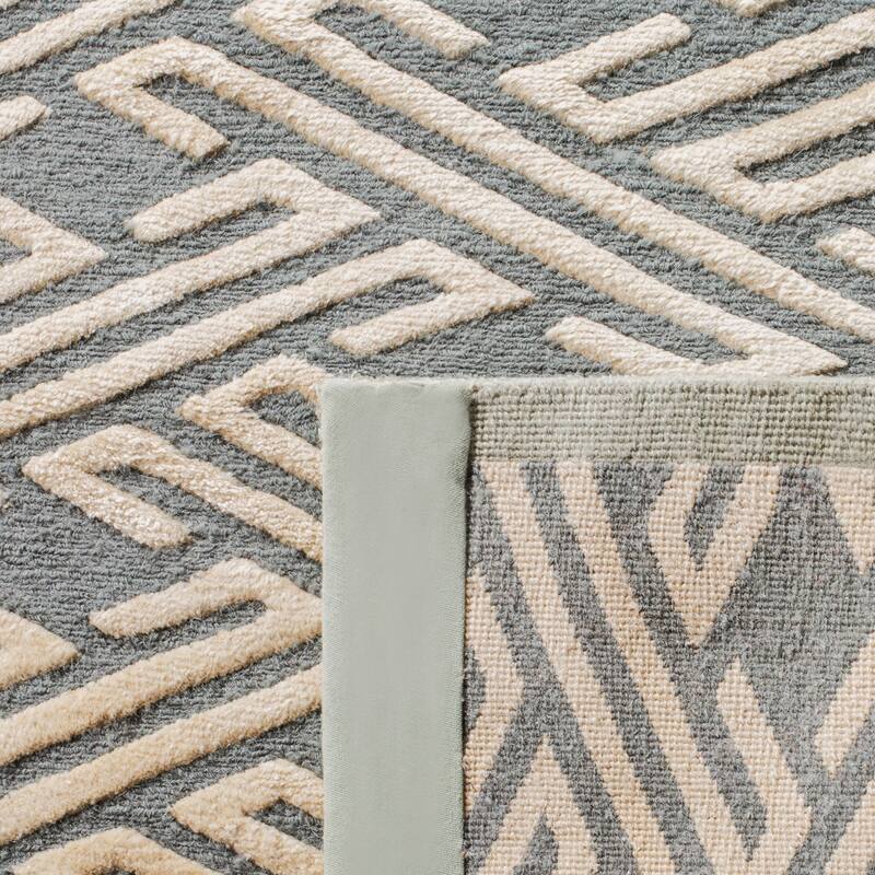 SAFAVIEH Couture Hand-knotted Norberta Modern Wool Rug