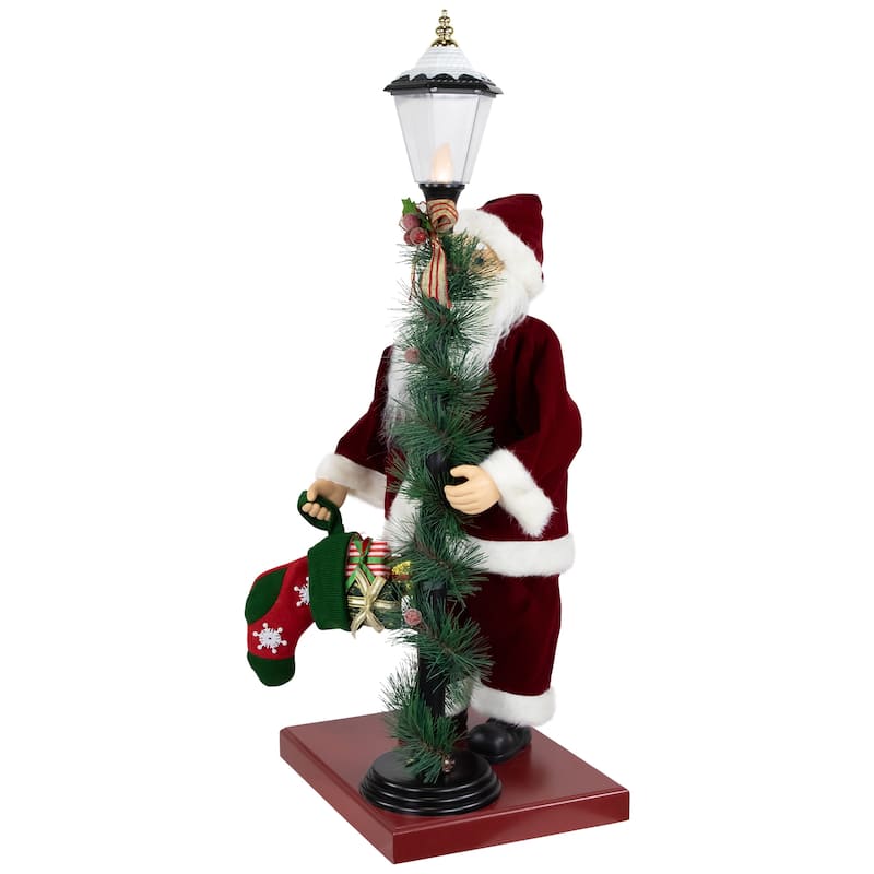 Animated and Musical Santa Claus Figure with Lighted Lamppost and Christmas Stocking - 31"