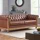 preview thumbnail 2 of 39, Castalia Nailhead Trim Chesterfield Sofa by Christopher Knight Home - 78.75" L x 33.50" W x 28.00" H Faux Leather + Cognac Brown, Natural