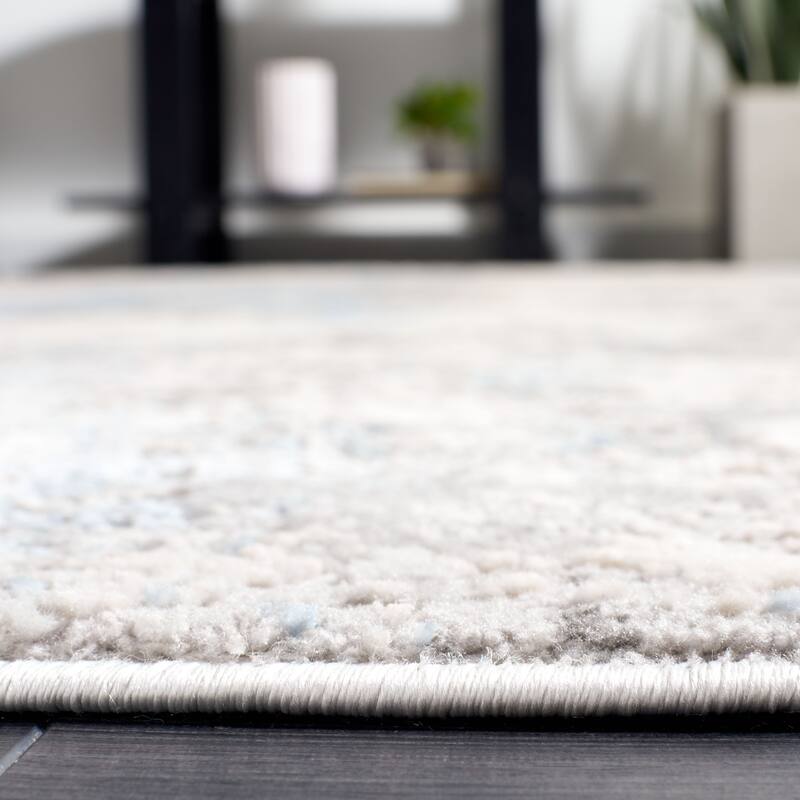 SAFAVIEH Lagoon Irmtraud Modern Abstract Polyester Area Rug