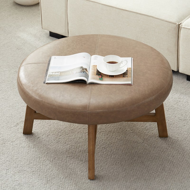 Round Upholstered Coffee Table with Solid Wood Base, Modern Fabric Ottoman Table for Living Room
