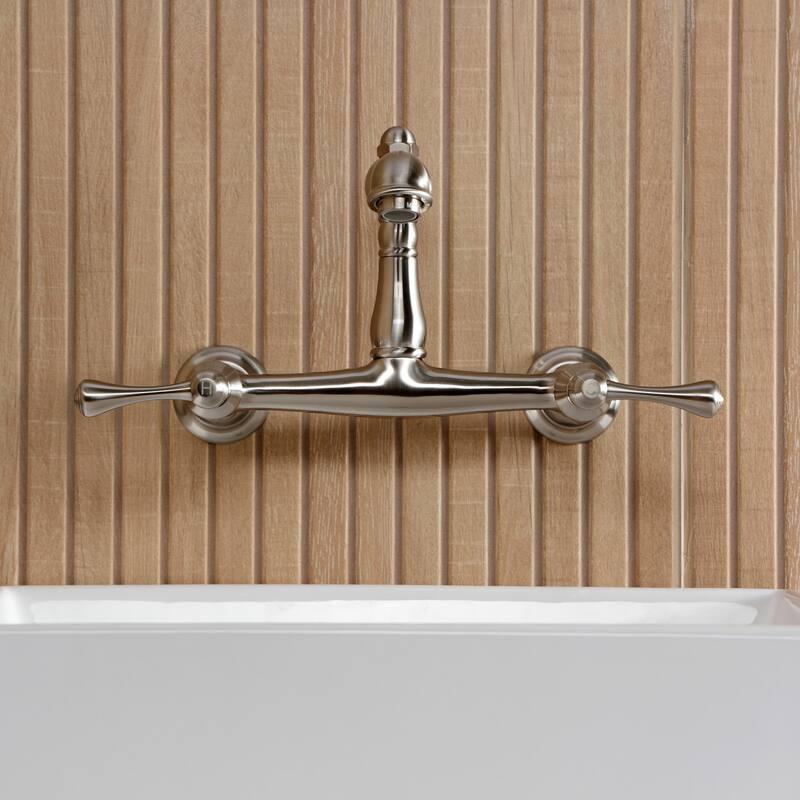 Kingston Brass English Country Two-Handle 2-Hole Wall Mount Bathroom Faucet