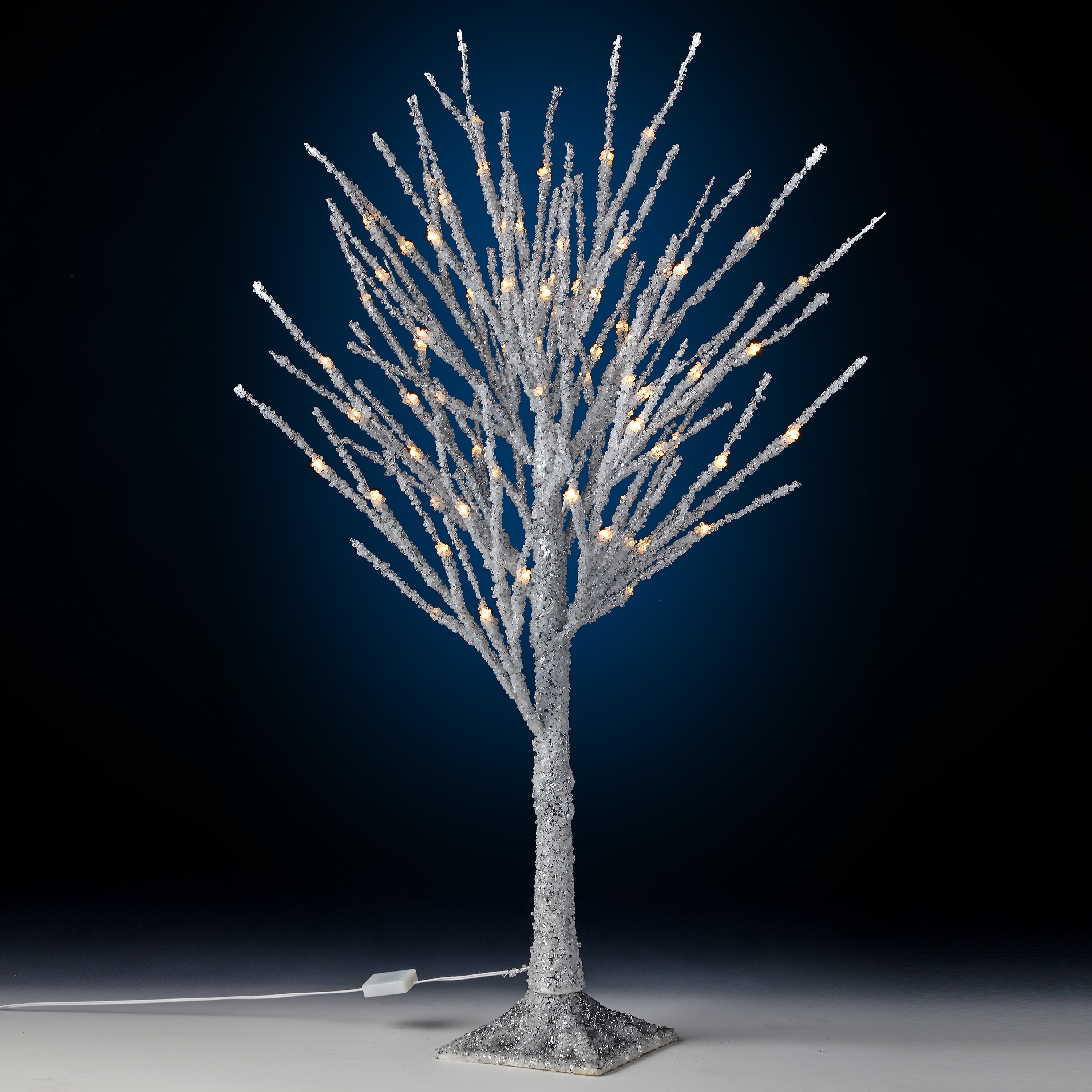 https://ak1.ostkcdn.com/images/products/is/images/direct/fcc7f9f278a529cdfc4da90e77b641a6a5baae7a/24%22-Metallic-Winter-Tree%2C-LED%2C-Battery-Timer-Remote%2C-Plug-in.jpg