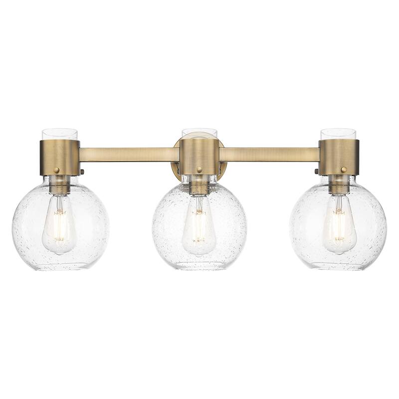 Innovations Lighting Downtown Urban - Lawton Sphere - 3 Light 24" Wall-Mounted Bath Vanity Light - Brushed Brass, Seedy