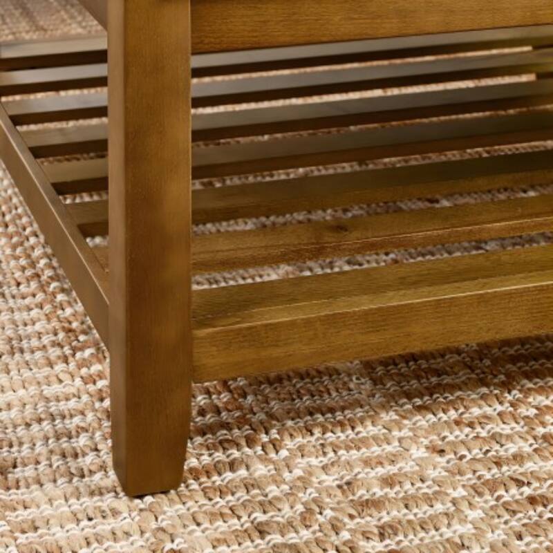 Coffee table with tufted linen upholstery