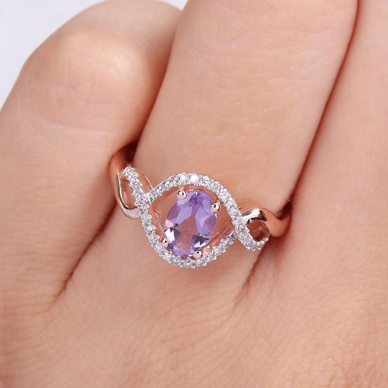 Miadora 10k Rose Gold Amethyst and 1/6ct TDW Diamond Halo Infinity Ring
