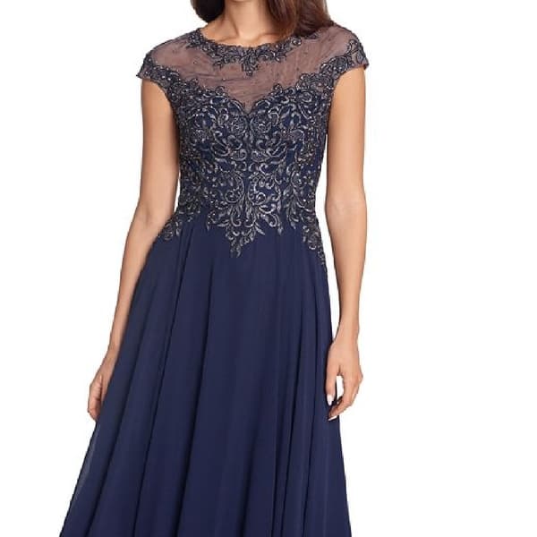 green emerald velvet dress Amazon.com: Xscape Women's Short Sleeve Beaded Illusion Neckline Ruched Gown,  Navy, 6 : Clothing, Shoes & Jewelry main image 1