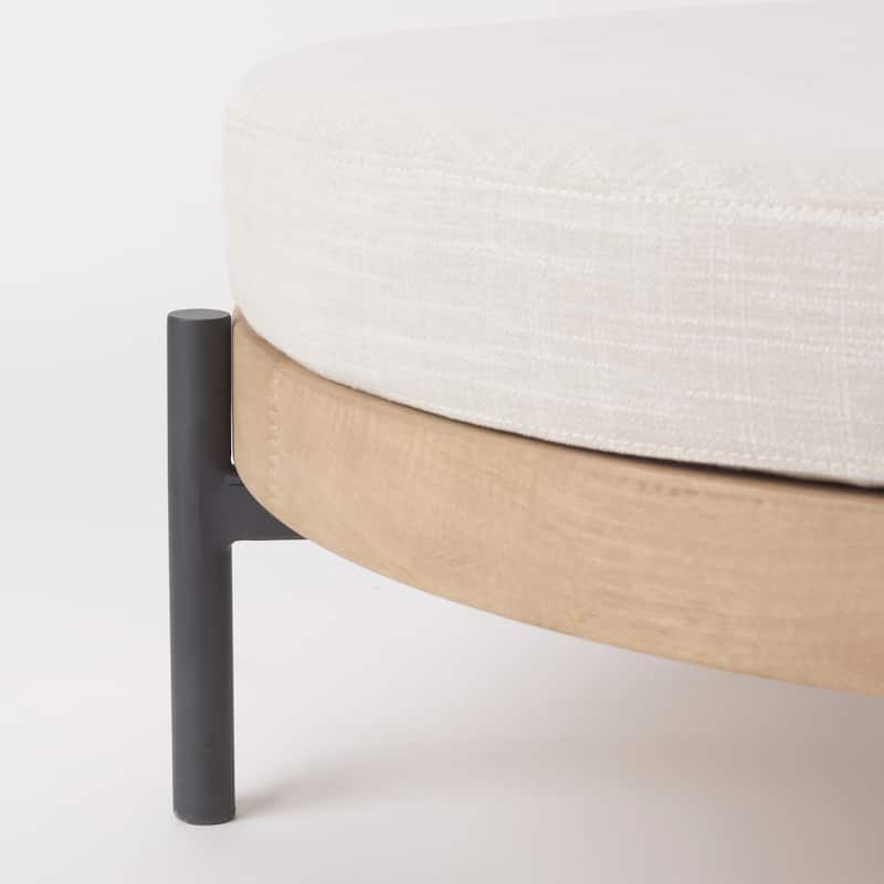 Colburne Cream Fabric with Light Brown Solid Wood Trim and Black Metal Legs Round Ottoman
