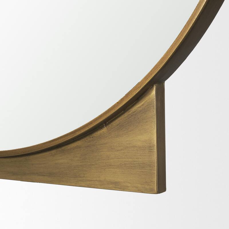 Tillie is a round mirror with a brushed gold metal frame. - 36.0L x 1.8W x 37.5H