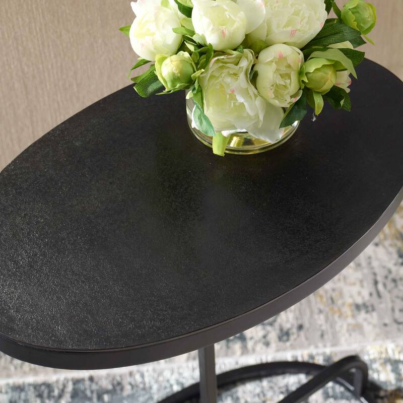Strick & Bolton Aged Black Aluminum Oval Accent Table