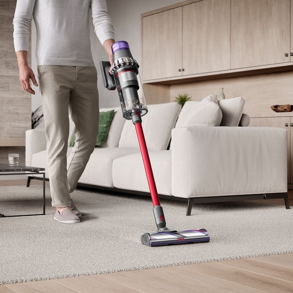 Dyson cordless vacuum used on a carpet