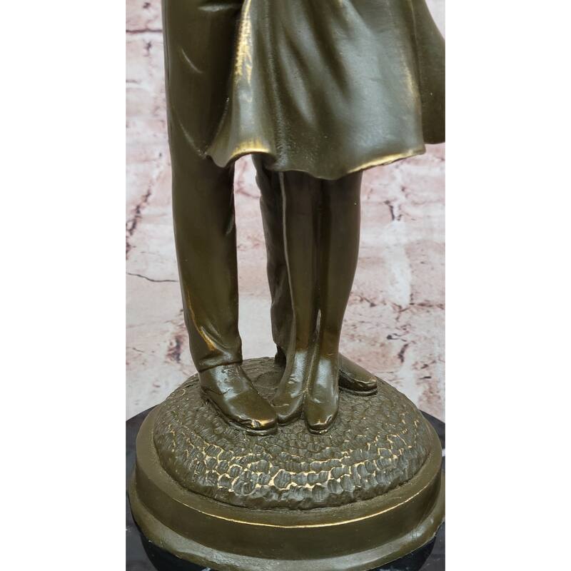 Bronze Sculpture Of Young Family Holding Newborn Baby By Milo