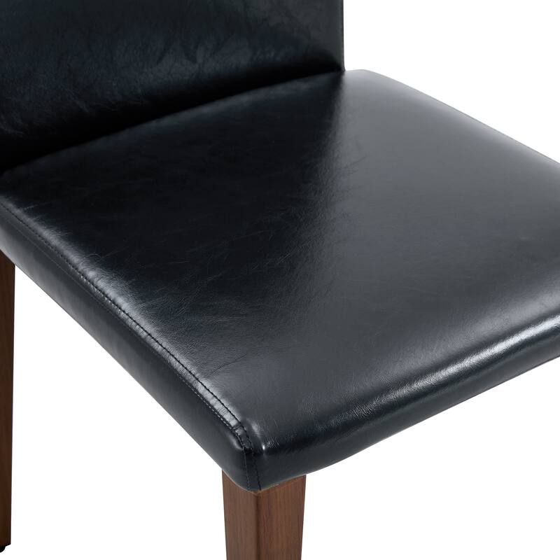 Four black PU dining chairs, simple and versatile, comfortable and accompanied. The exquisite and multifunctional dining