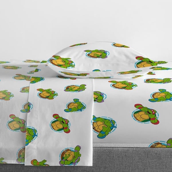 https://ak1.ostkcdn.com/images/products/is/images/direct/fdc348142e039315a005d3bcfe93f6533600d860/TMNT-Green-Bricks-Toddler-Bed-Set.jpg?impolicy=medium