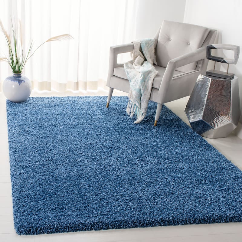 SAFAVIEH Evolution Shag Gwenaele Solid 1.8-inch Thick Rug - 5'3" x 7'6" - Blue - Rectangle
