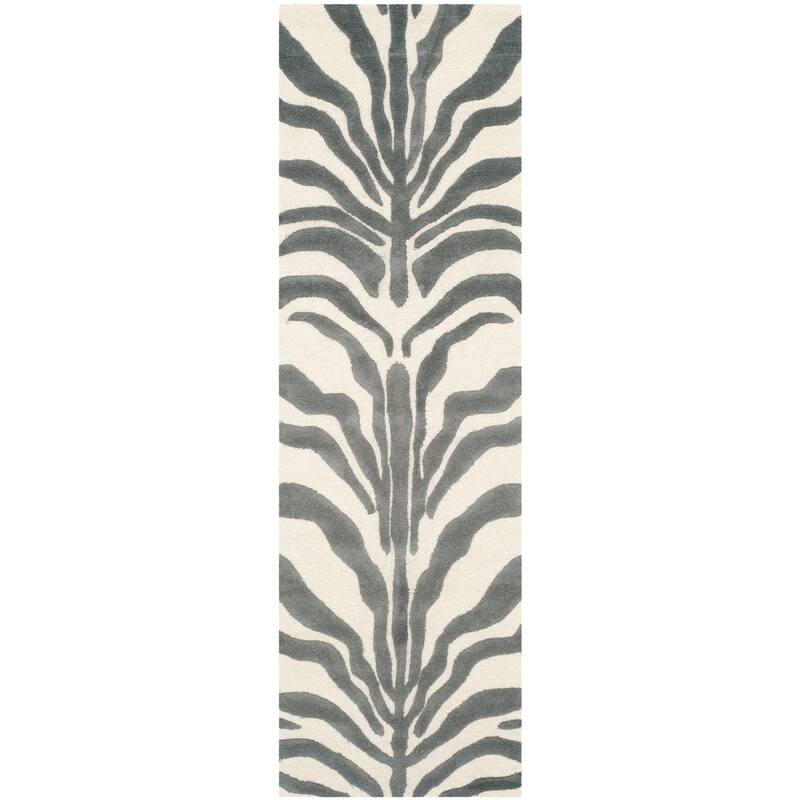 SAFAVIEH Handmade Cambridge Rikey Animal Print Wool Rug