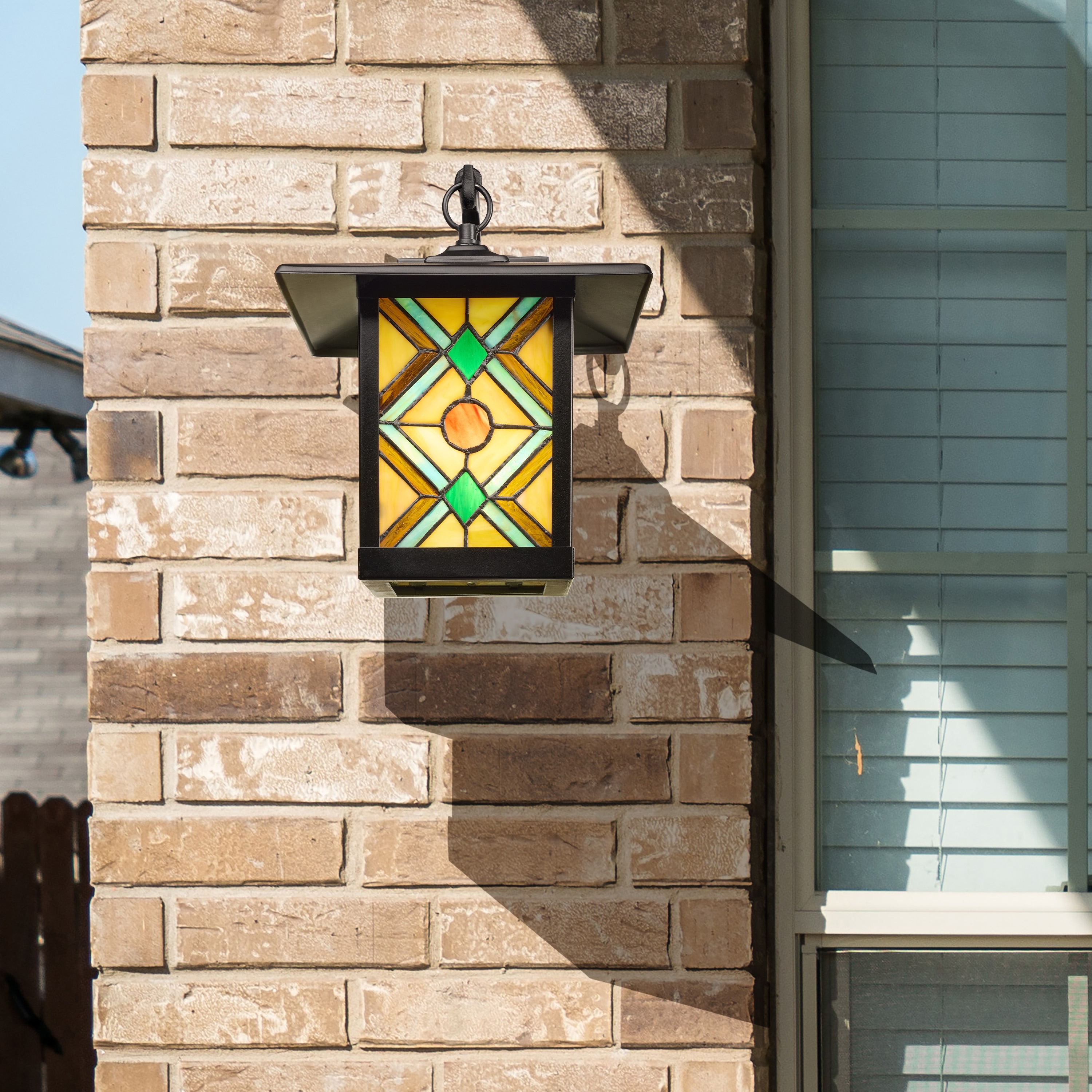 River of Goods Multicolor Tiffany-Style Stained Glass and Black 1-Light Outdoor Lantern Wall Sconce - 10.75" x 9" x 11.75"