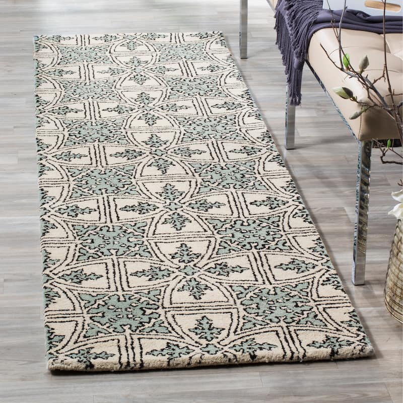 SAFAVIEH Handmade Chatham Laurane Modern Moroccan Wool Rug - 2'3" x 7' Runner - Light Blue/Ivory