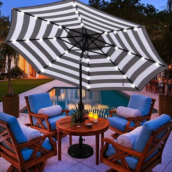 9 ft black patio umbrella WestinTrends ft. Solar Power LED lights Market with Round Base and how can a comfortable patio be without a LED patio umbrella 9 Foot Auto-Tilt Market Umbrella