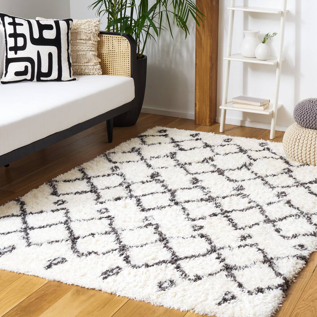 SAFAVIEH Handmade Flokati Theresie Shag Solid Polyester Rug
