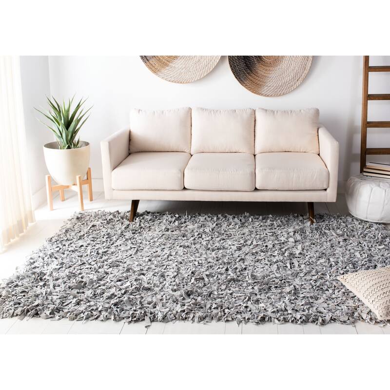 SAFAVIEH Handmade Leather Shag Carlijn Modern Decorative Rug