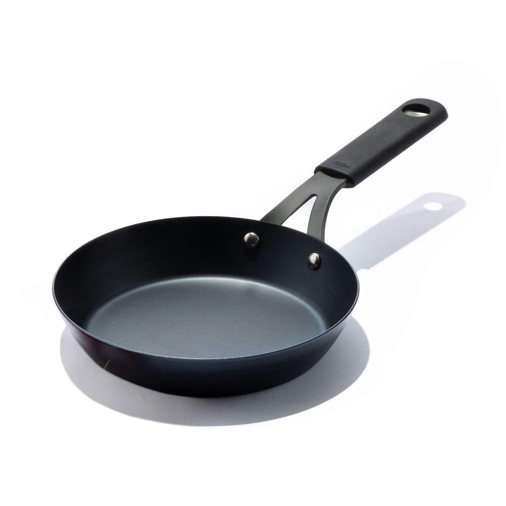 https://ak1.ostkcdn.com/images/products/is/images/direct/ff1e7168c3e23f46ead67d2d37d647d0f4124f0a/OXO-Black-Steel-Fry-Pan-w--Silicone-Sleeve.jpg