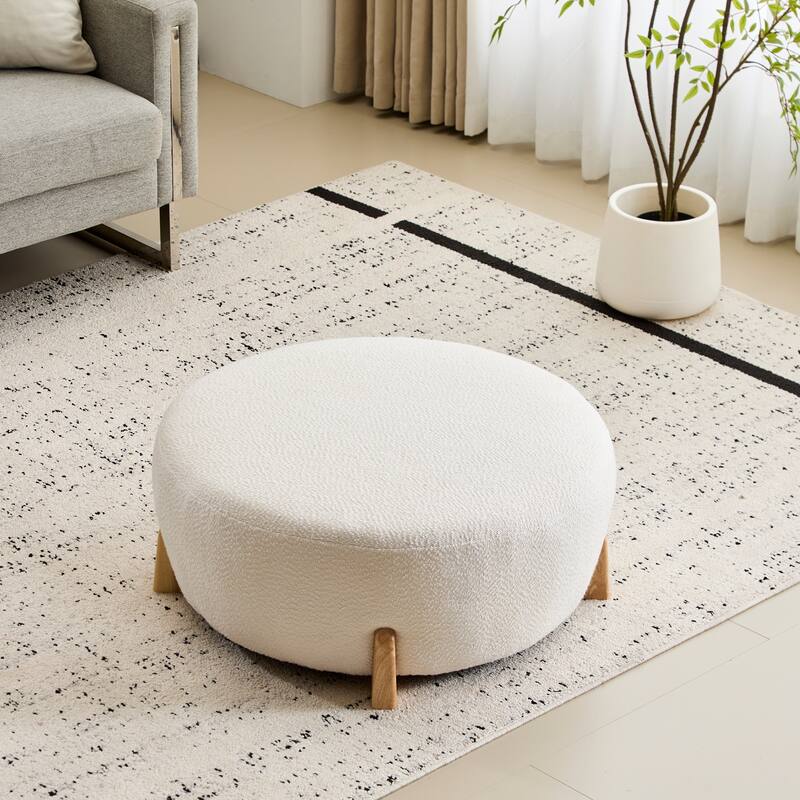 Modish White Round Boucle Ottoman with Splayed Rubber Wood Legs