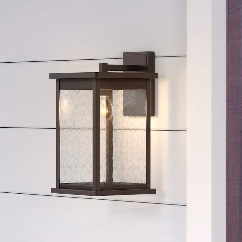 Millennium Lighting Bowton 1 Light Outdoor Wall Sconce in Powder Coat Bronze with a Clear Glass Shade