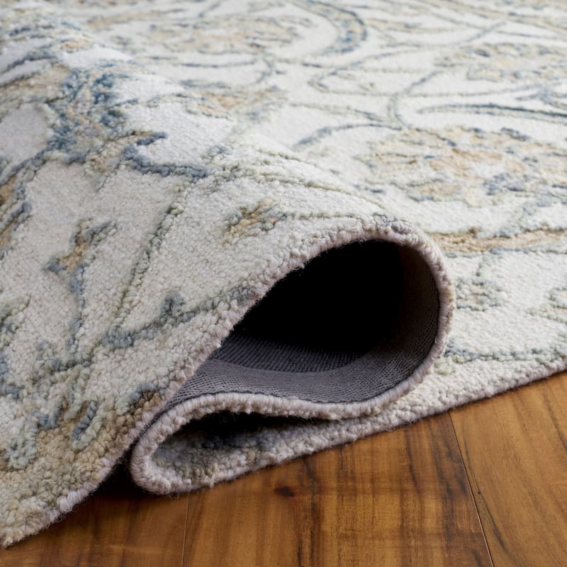 SAFAVIEH Handmade Metro Medrea Wool Rug