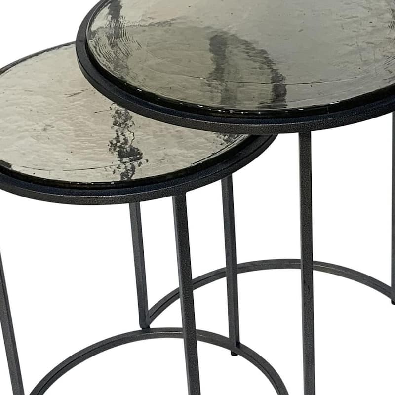HomeRoots Set of Two Clear and Gunmetal Glass and Iron Round Frame Nested Tables - 18.5 in. x 22 in. x 18.5 in.
