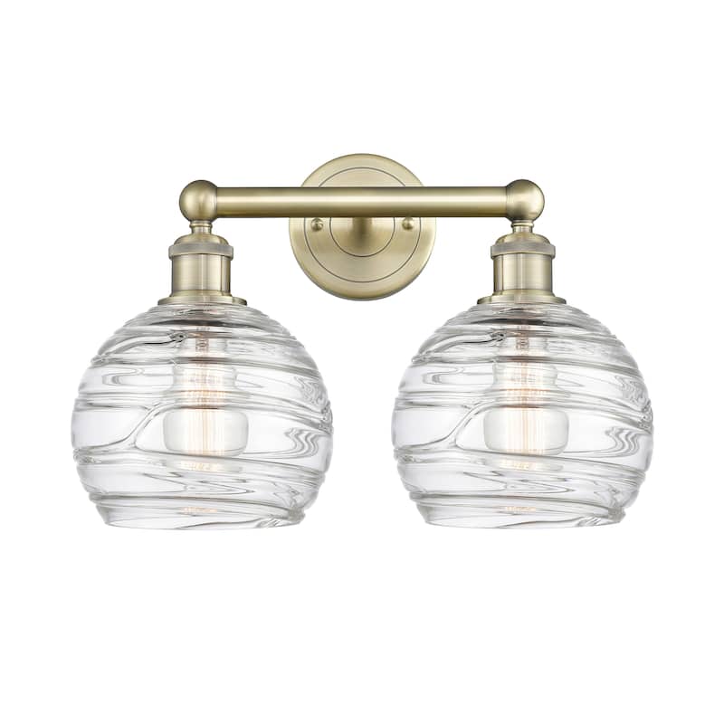 Innovations Lighting Athens Deco Swirl - 2 Light 17" Bath Vanity Light - Antique Brass/Clear Deco Swirl