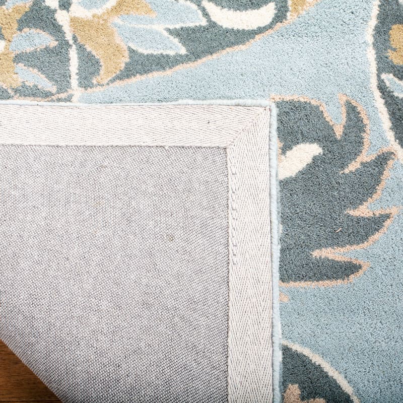 SAFAVIEH Handmade Wyndham Rosaleen Modern Wool Rug